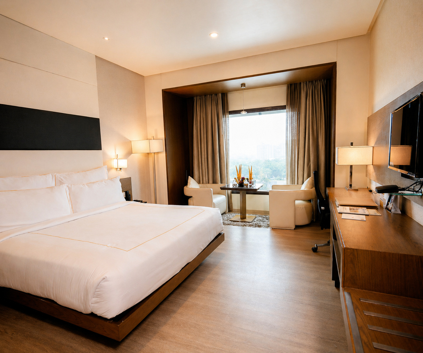 Deluxe Room with king-size bed, TV and window seating